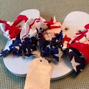 Hand-decorated flip flops designed with patriotic flag bandannas. New!
